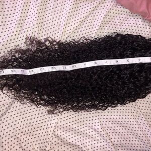 Loose curly human hair ponytail
